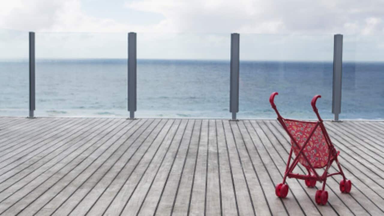 Baby stroller on wooden Dock
