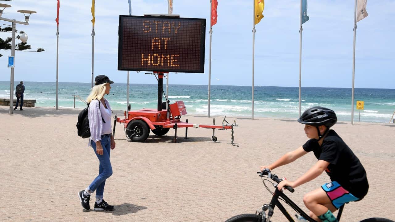 Stay at home sign at Manly Beach