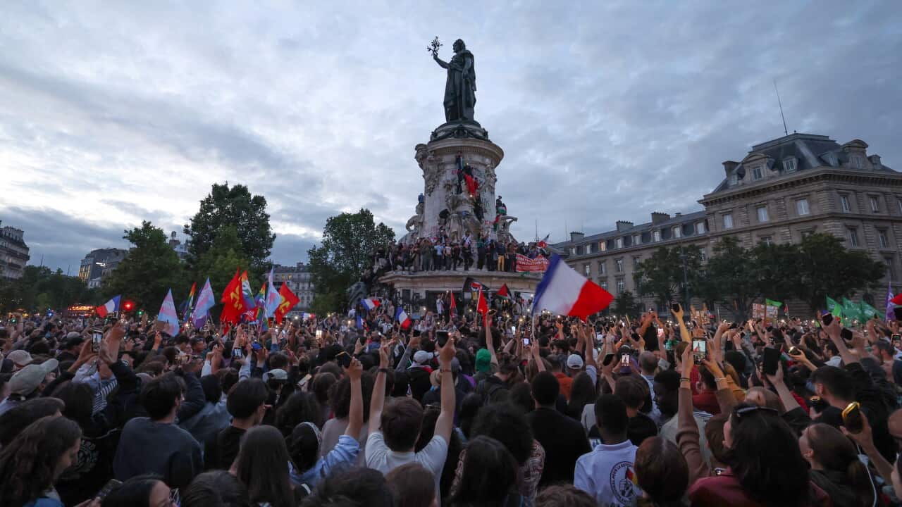 French elections: Leftist alliance projected to win most seats in surprise swing