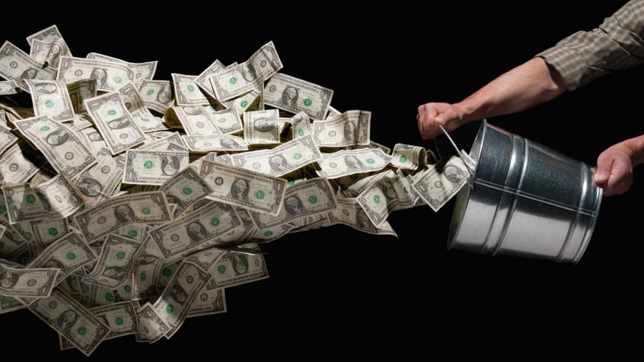 Throwing bucket of money