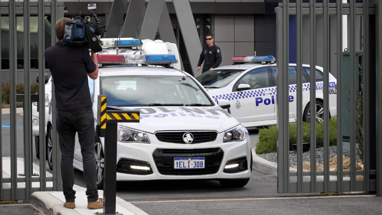 A police convoy escorts serial armed robber and prison escapee Brenden Abbott after his extradition to Western Australia