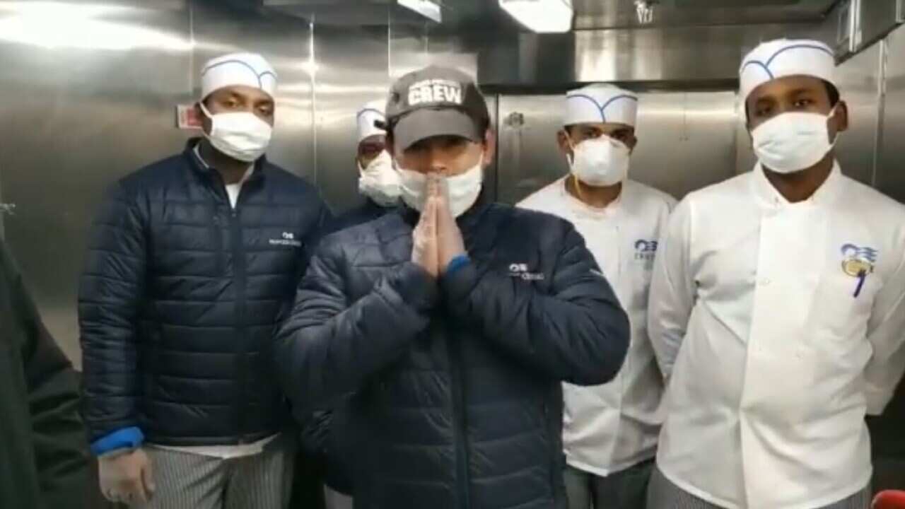 Binay Sarkar with the crew member of Dimond Princess cruies in Japan