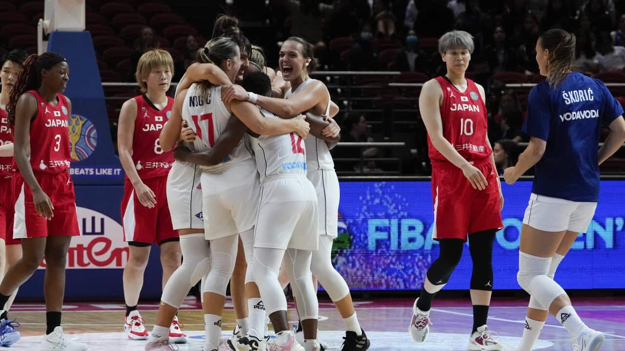 Serbian players celebrate after defeating Japan during their game at the women's Basketball World Cup in Sydney