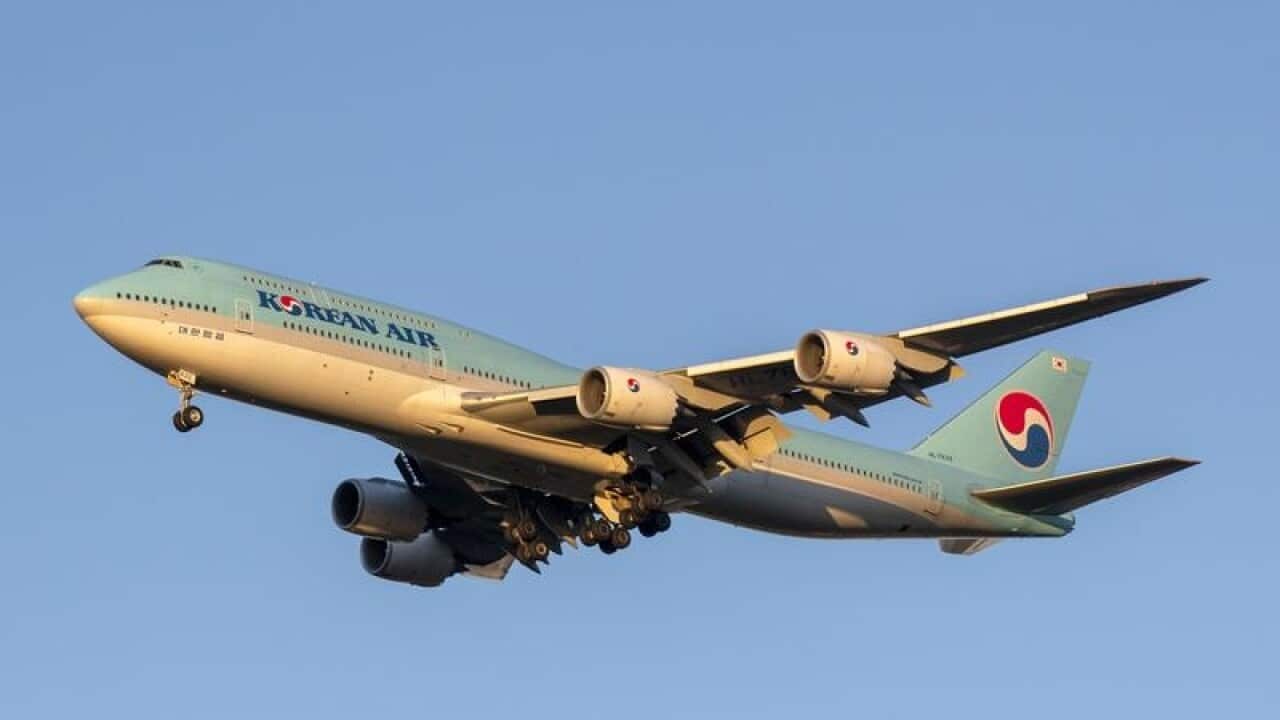 A Korean Air Lines Boeing 747-8B5 plane lands at Heathrow