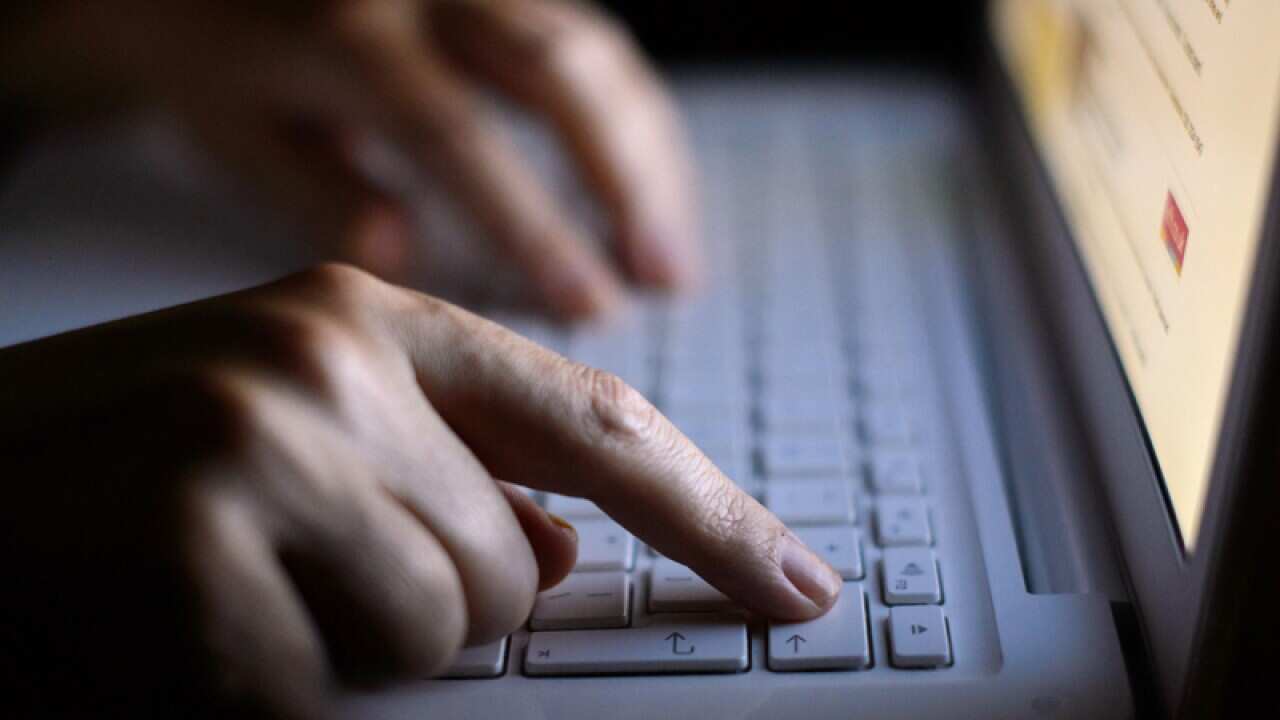 A person using a laptop computer