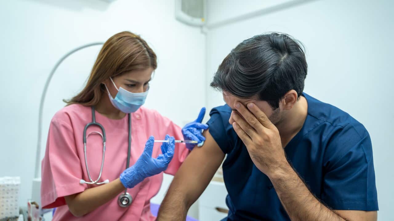 Female doctor giving injection to patient,Vaccination and prevention against flu or virus pandemic.