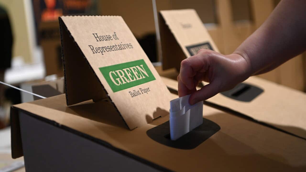 Voters cast their ballots at a polling booth in Brisbane, Australia.