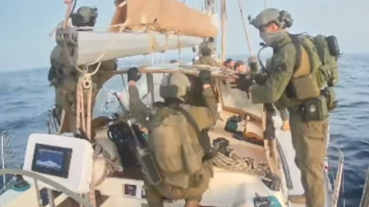 Israeli navy soldiers aboard one of the flotilla's vessels