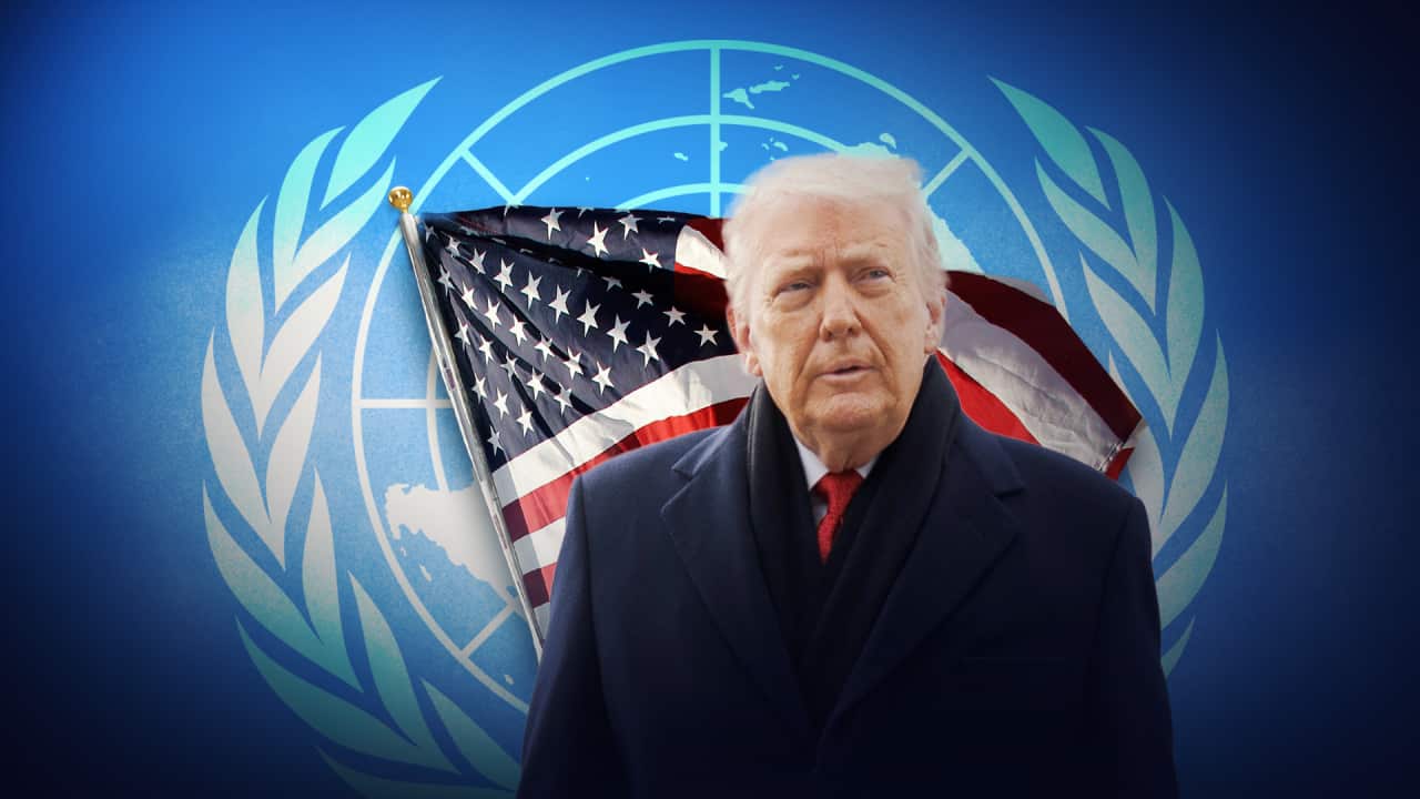 Donald Trump with a US and UN flag