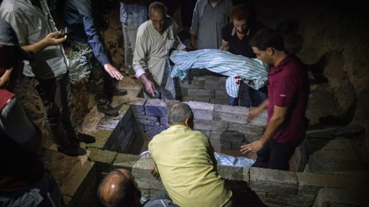 syria_bodies_2_getty_130822.jpg