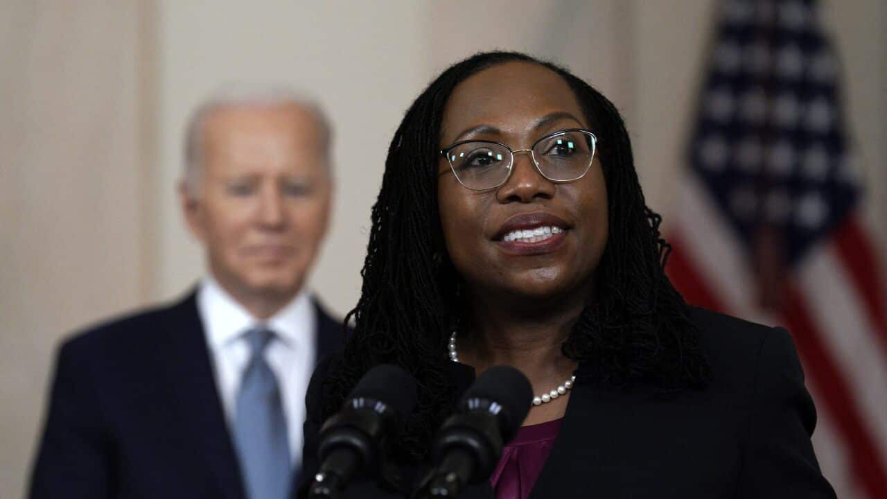 Judge Ketanji Brown Jackson speaks next to US President Joe Biden