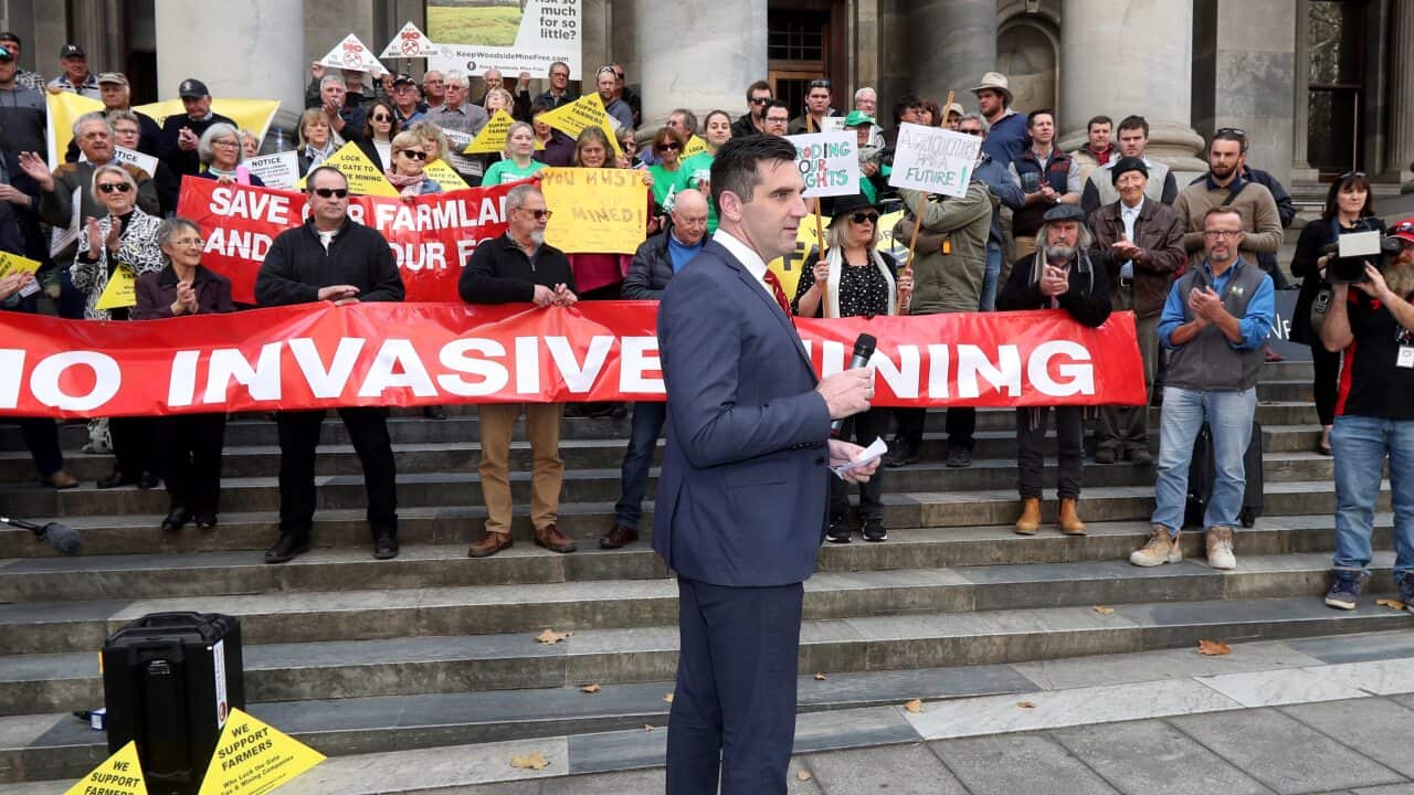 SA Member for Narungga Fraser Ellis speaks during a South Australian farmers protest on the steps of parliament in Adelaide, Wednesday, July 3, 2019. (AAP Image/Kelly Barnes) NO ARCHIVING