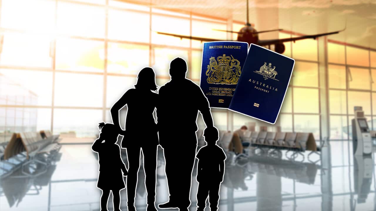 A silhouetted family at an airport