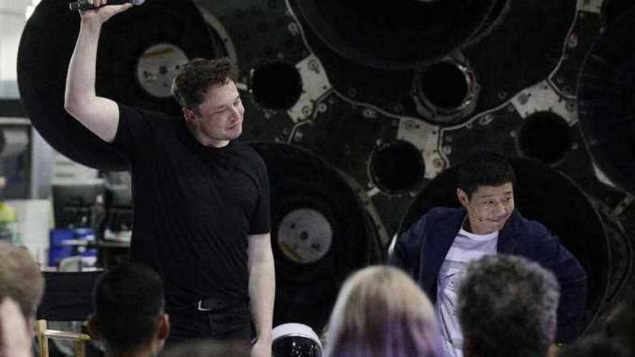 SpaceX founder and chief executive Elon Musk, announces Japanese billionaire Yusaku Maezawa as the first private passenger on a trip around the moon.