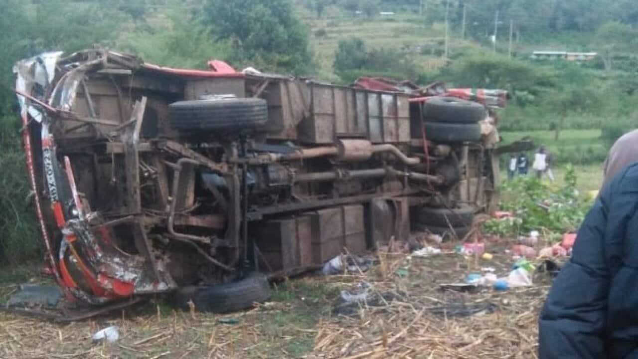 The overturned bus, via The Standard Digital