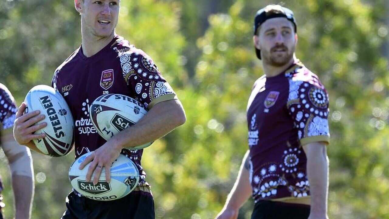 Daly Cherry-Evans and Cameron Munster