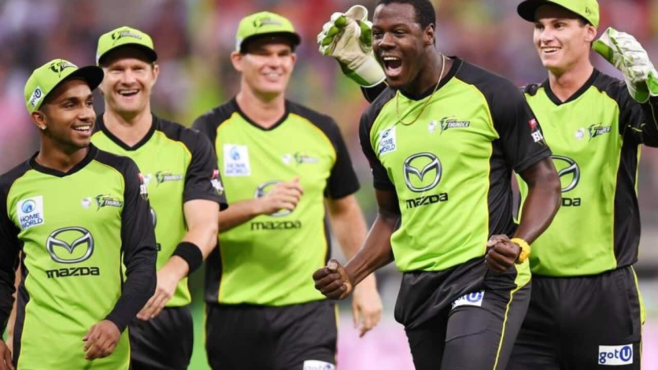 Sydney Thunder celebrate a Carlos Braithwaite wicket
