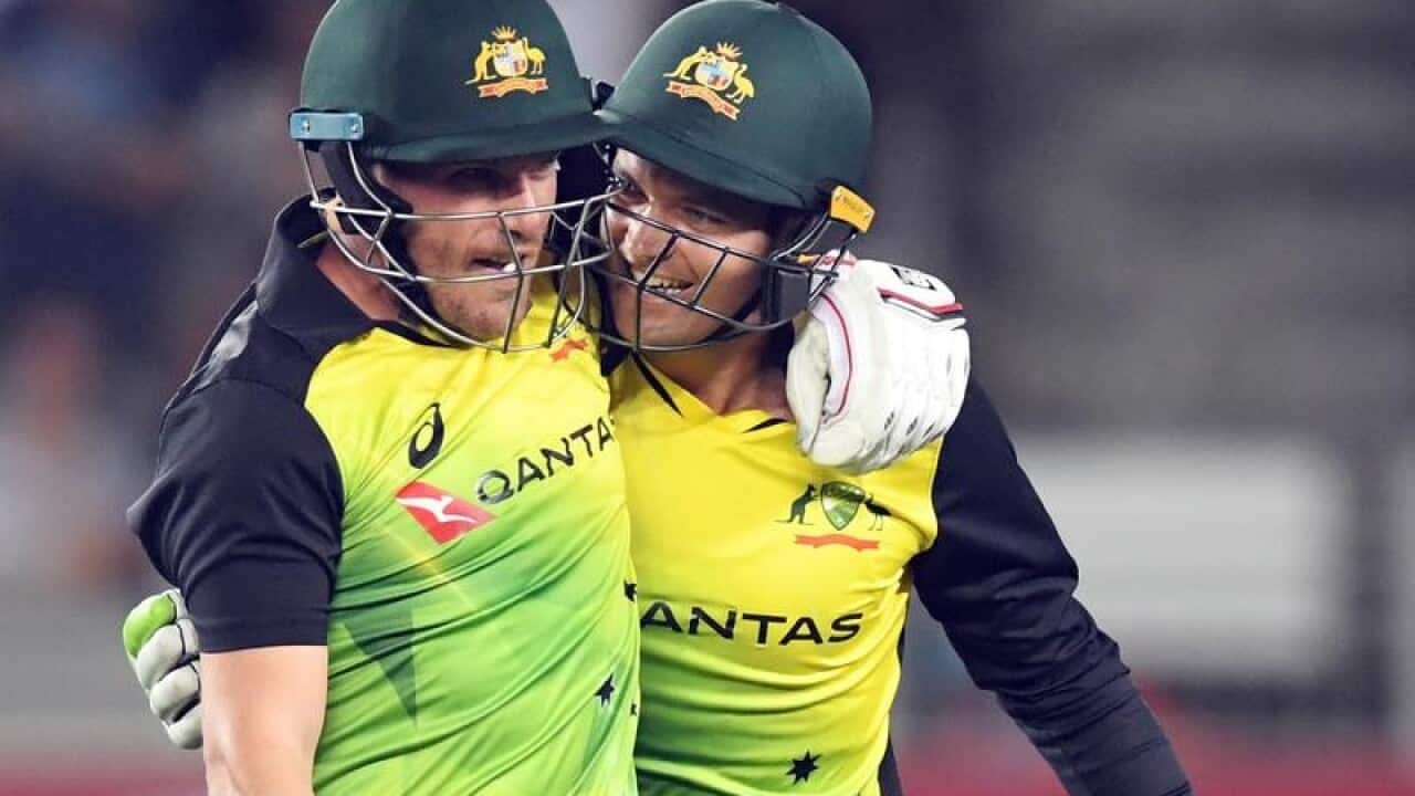 Aaron Finch and Alex Carey.