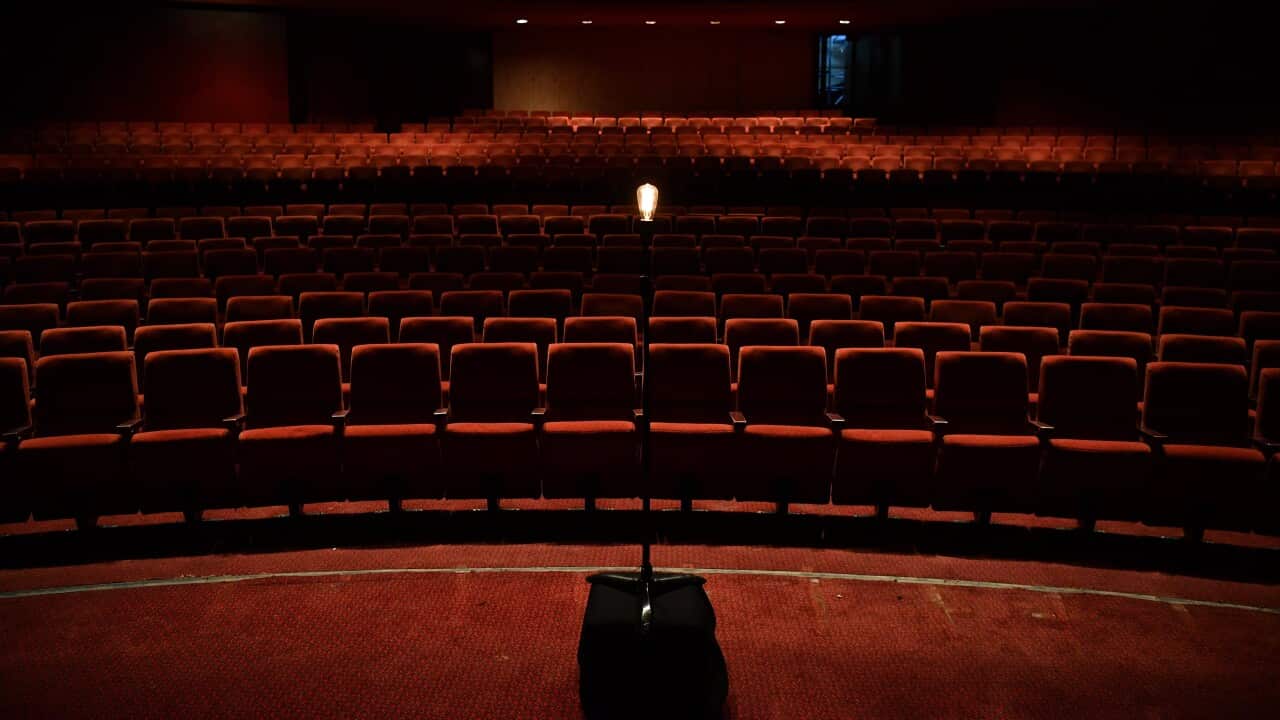 The Sydney Opera House keeps a single light globe on during the coronavirus shutdown as part of a long running theatre tradition.