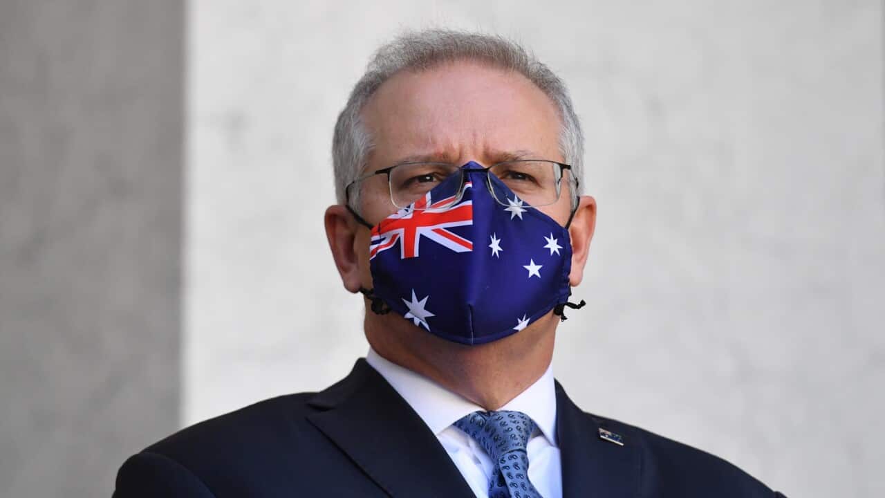 A masked Prime Minister Scott Morrison