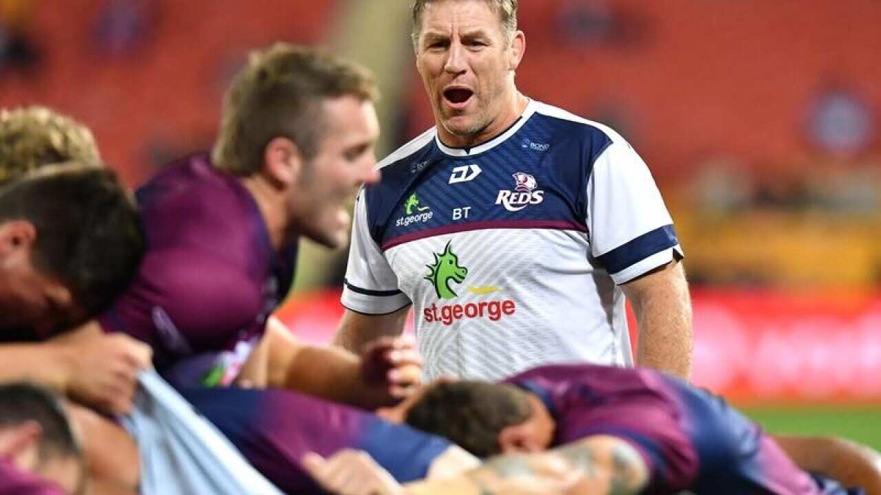 Reds coach Brad Thorn (centre).