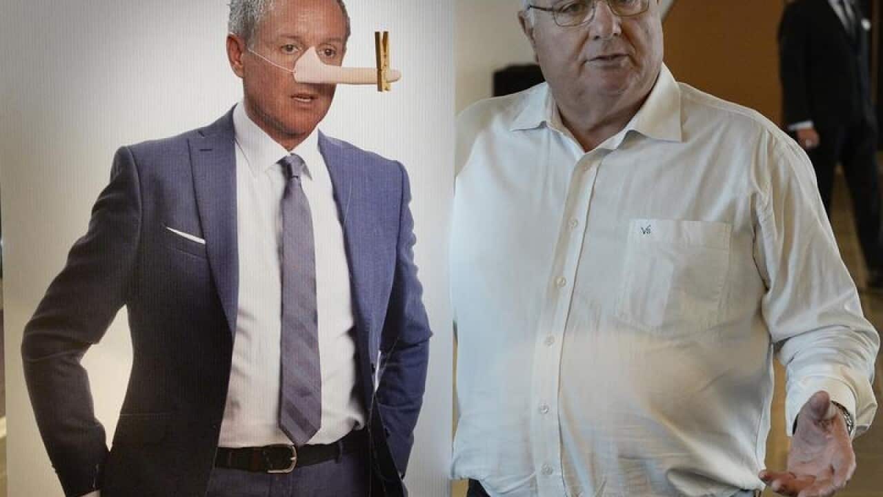 Independent candidate for Cheltenham Vince Scali poses with a cutout.