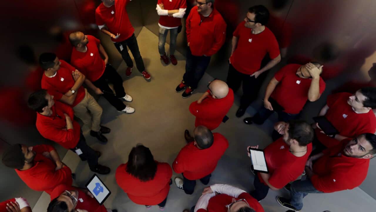Apple employees at an Apple Store in New York