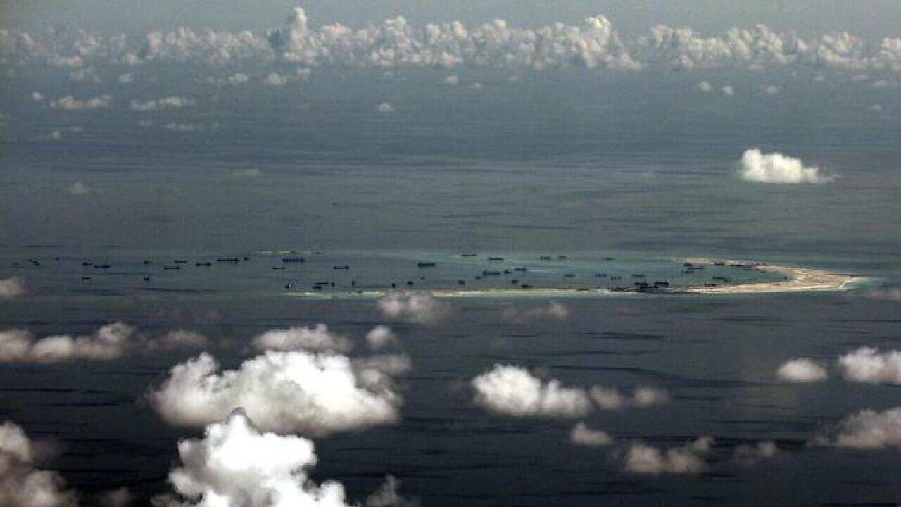A file picture dated 11 May 2015 shows an areal view of alleged artificial islands built by China in disputed waters in the South China Sea. (AAP)