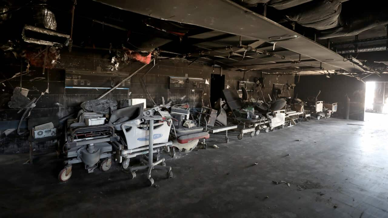 Rubble and blackened hospital equipment