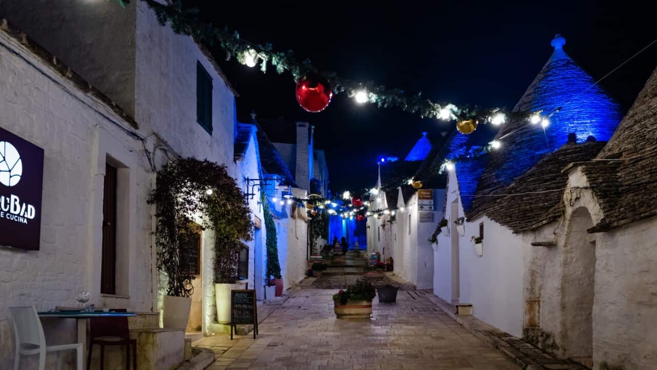 A street among the trulli of Alberobello decorated for Christmas with a single activity lit on December 10 in Alberobello. Alberobello festively lit from 7 December, the day of the Immaculate Conception, among the streets of the trulli there are Christmas