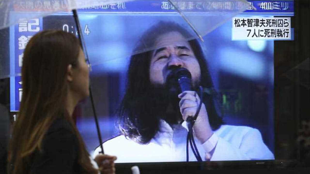 A TV screen on the street broadcasts the news that the Justice Ministry executed former Aum Supreme Truth cult leader Chizuo Matsumoto, also known as Shoko Asahara in Tokyo on July 6, 2018.