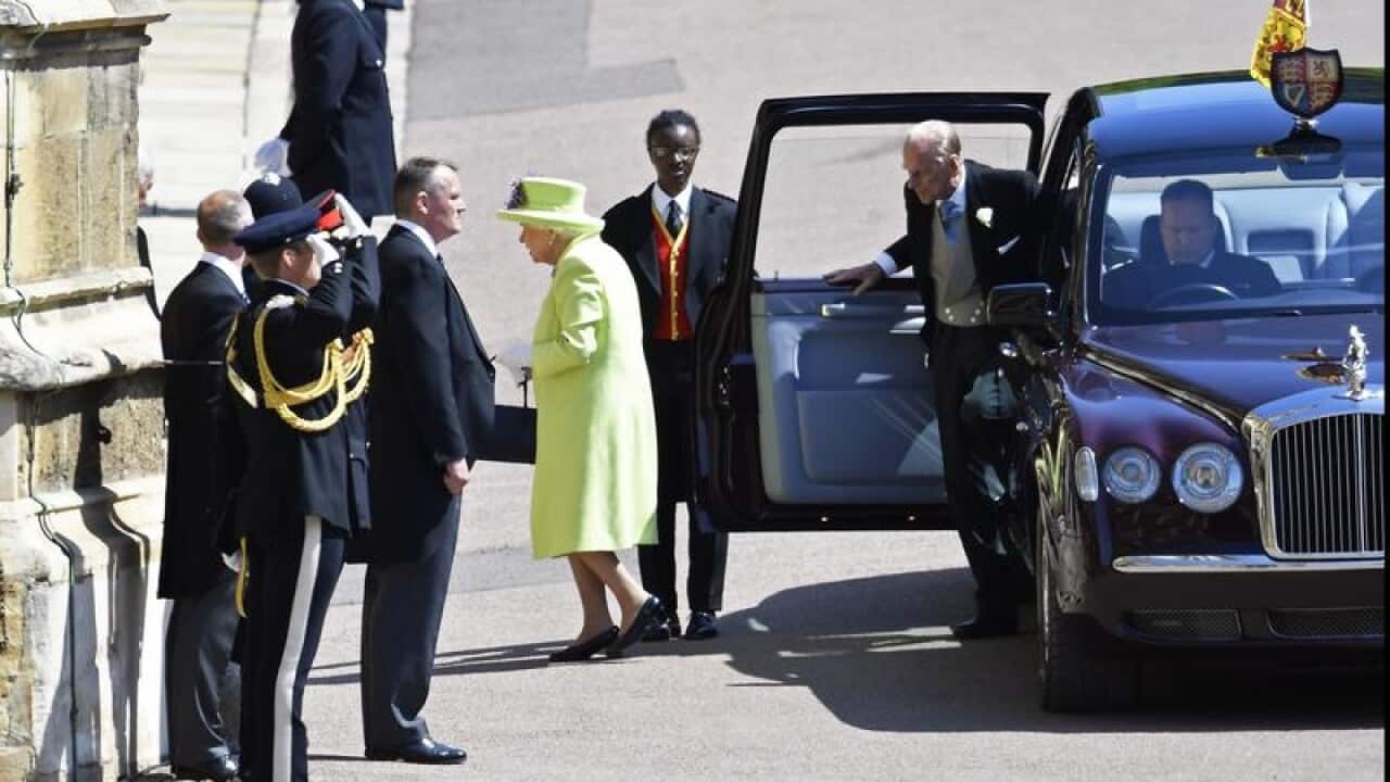 The Queen and Prince Philip arrive at Prince Harry's wedding.