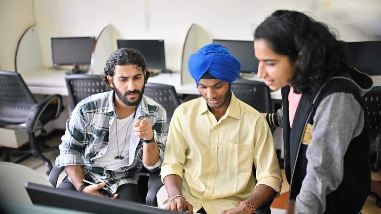 College students using desktop computers in Computer lab