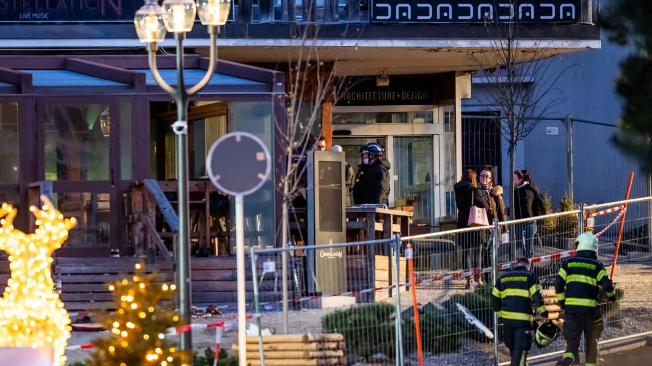 Rescue officials at the site of a fire