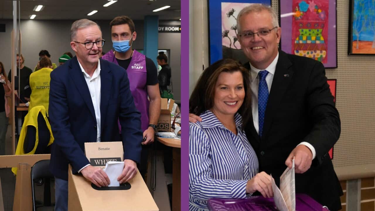 Anthony Albanese and Scott Morrison cast their votes