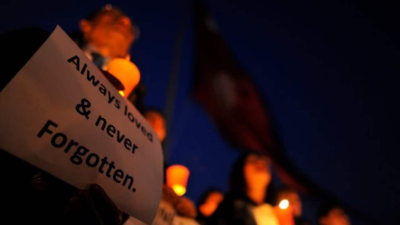 Nepali People attend a candlelight vigil to remember US-Bangla Plane Crash victims