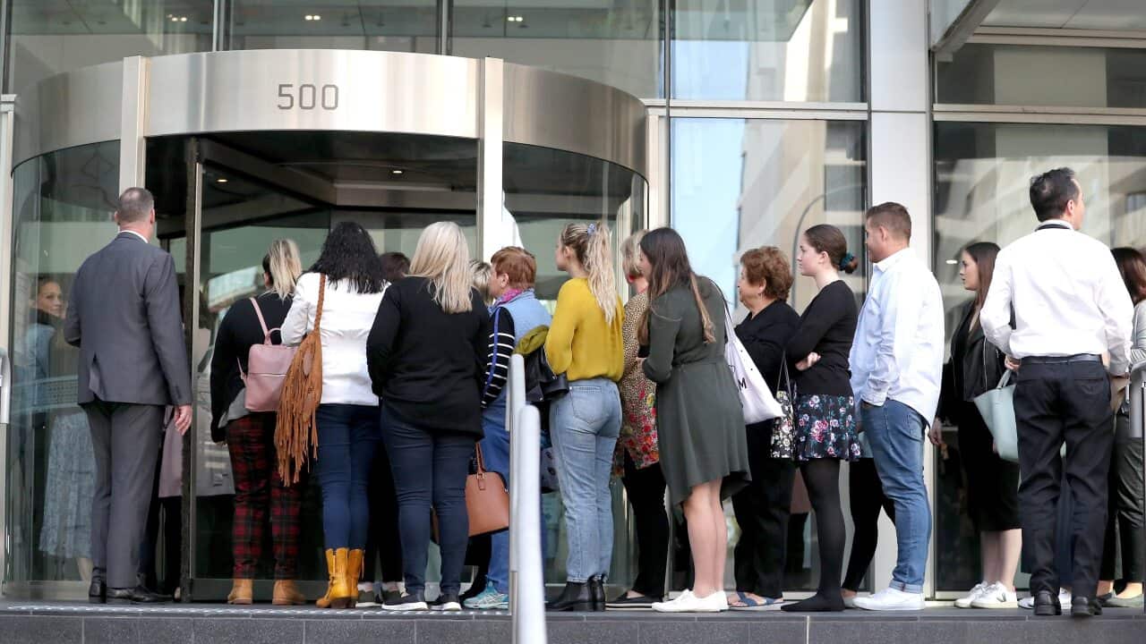 Members of the public enter the Supreme Court of Western Australia in Perth.
