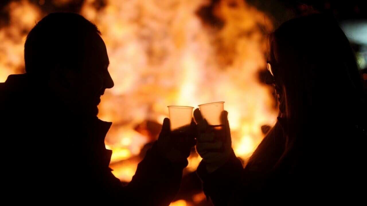 christmas_eve_toast_in_front_of_a_bonfire_ahead_of_the_orthodox_christmas_in_skopje_getty_images_larger.jpg