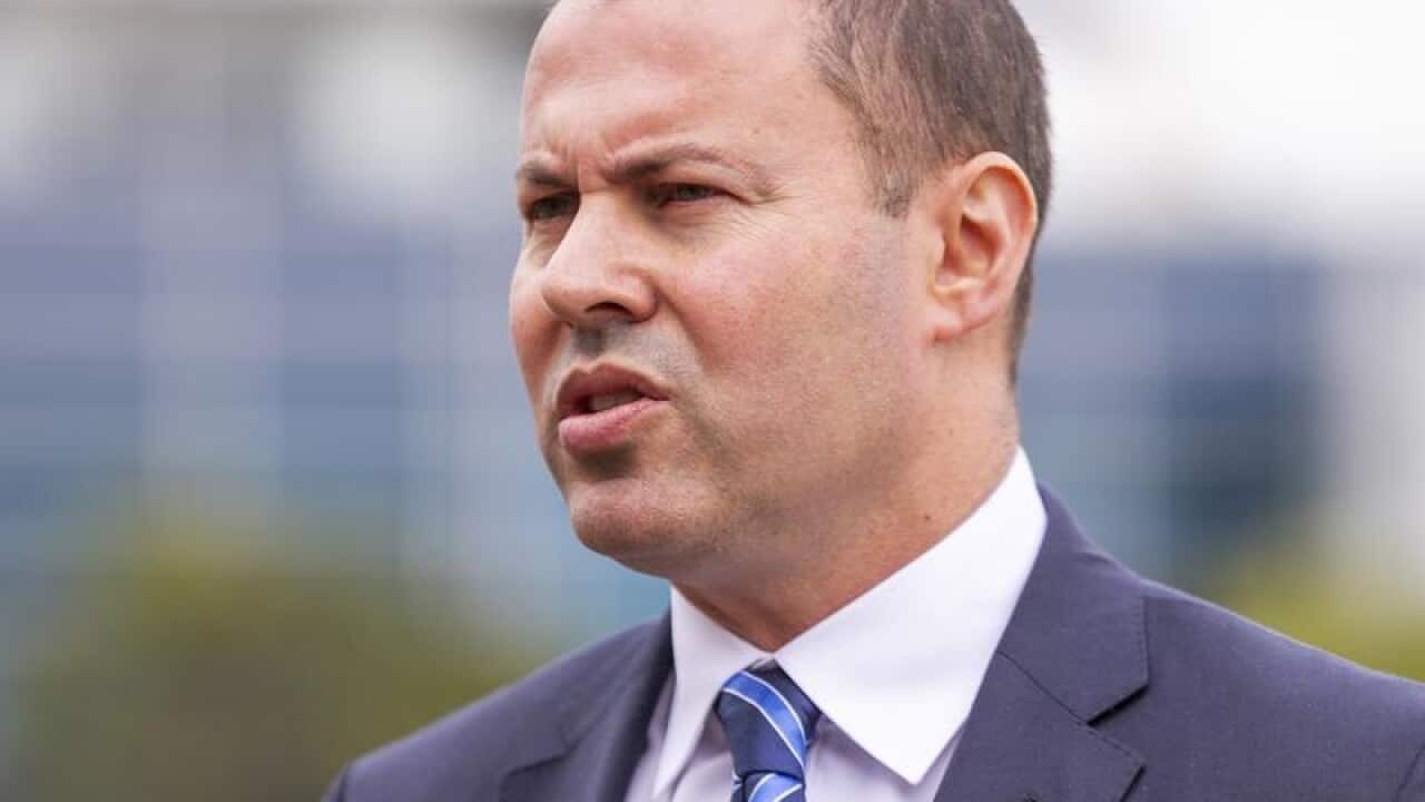 Treasurer Josh Frydenberg speaks to media.