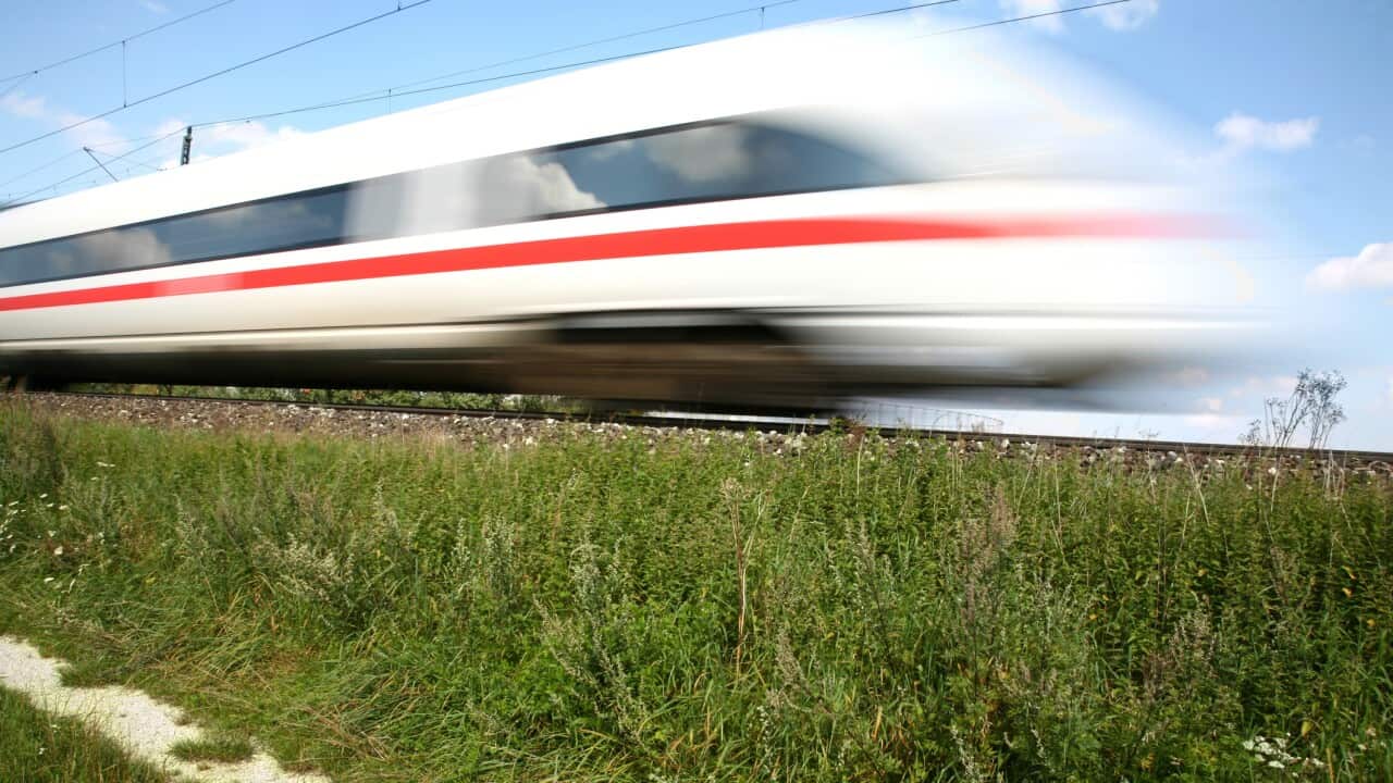 Bullet train breezing down the tracks