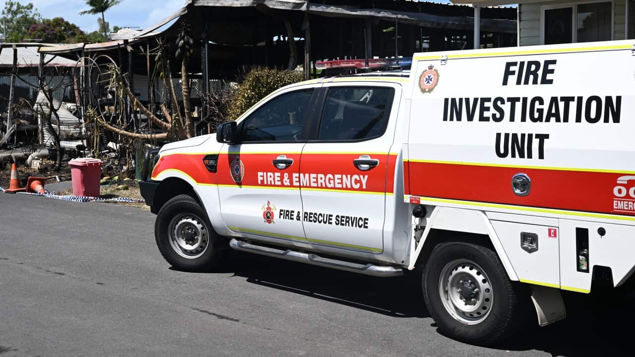 Emergency services attend the scene where the body of a person believed to be an 83-year-old male resident was found following a housing complex fire in Brisbane on Tuesday, 12 March 2024.