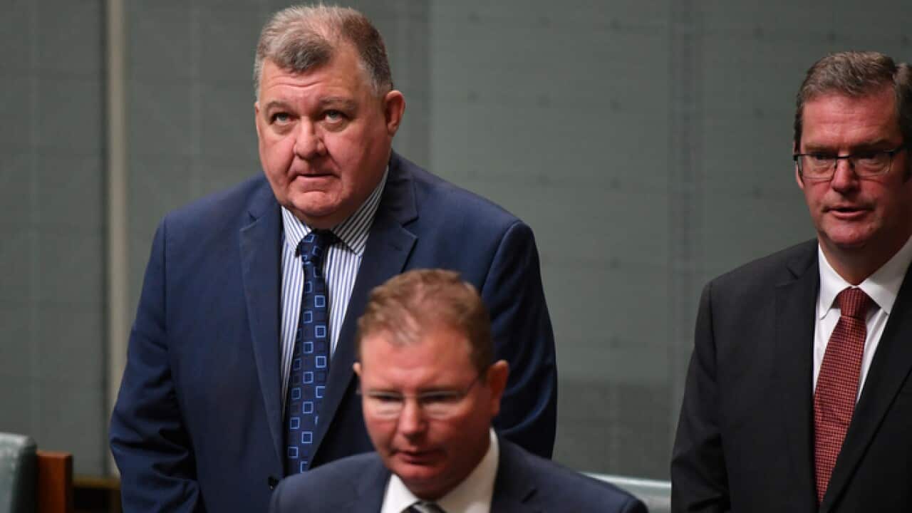 Liberal minister Craig Kelly (left)
