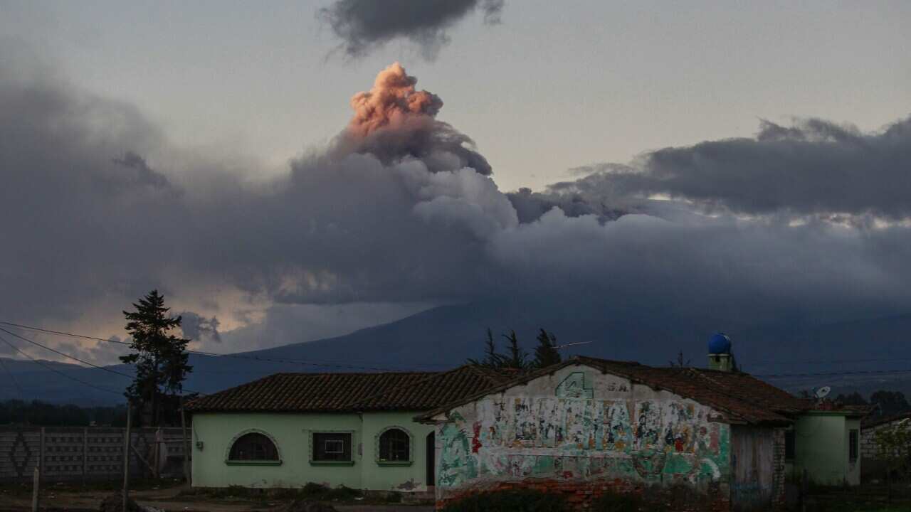 A general view from Saquisili village, of an ashes column spewed by the Cotopaxi volcano in Pichincha province, Ecuador, 15 August 2015. (EPA/Jose Jacome)