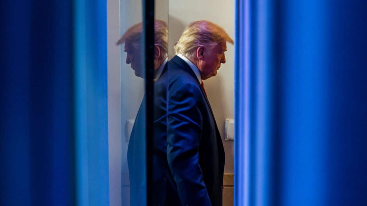 US President Donald J. Trump departs after delivering remarks on the pandemic