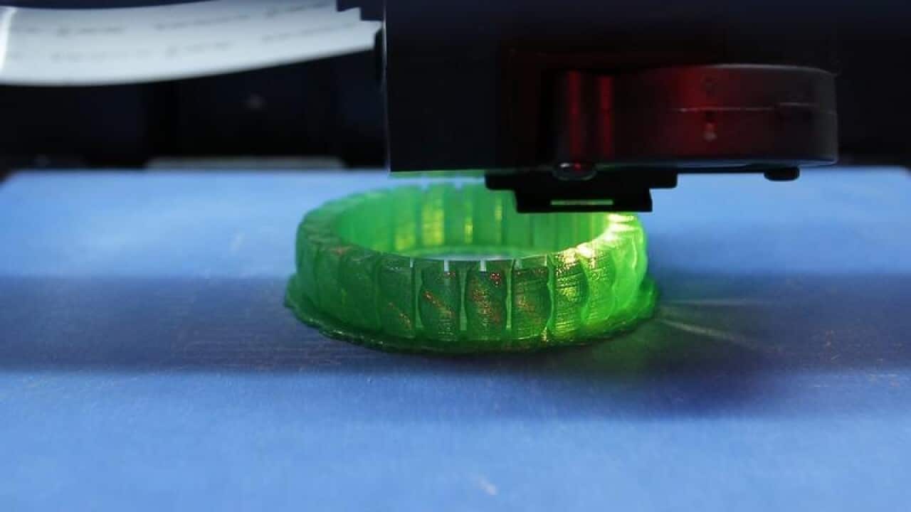 A stretchy bracelet is printed out with a 3D Printer