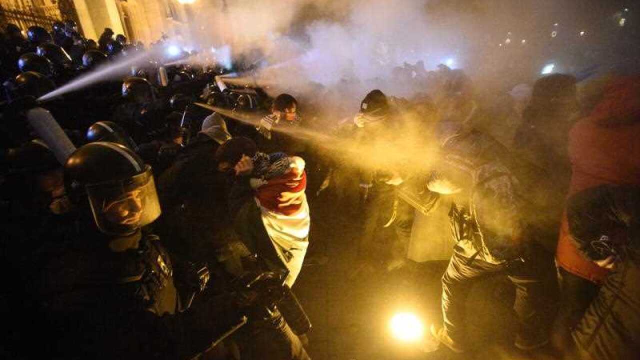 A rally protesting Hungary’s change to the labour laws started peacefully, but quickly turned violent, with protesters clashing with riot police.