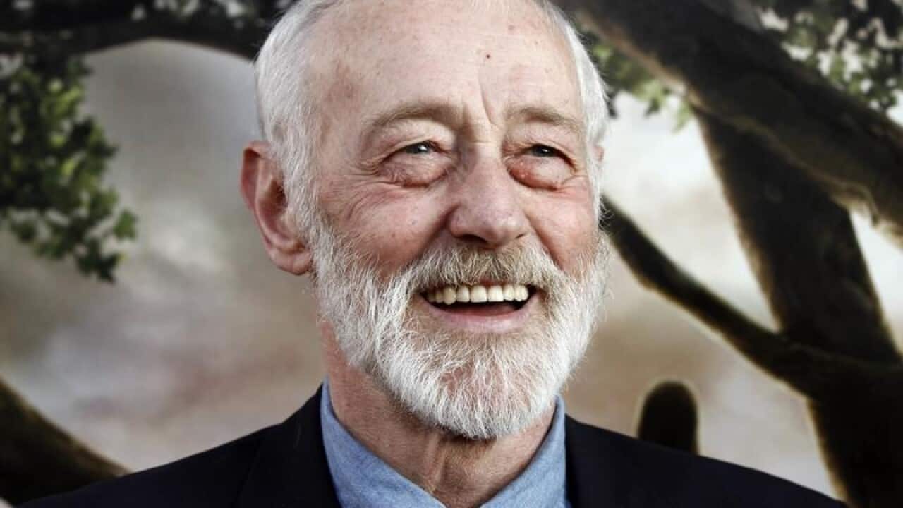 Actor John Mahoney smiles at a film premiere.
