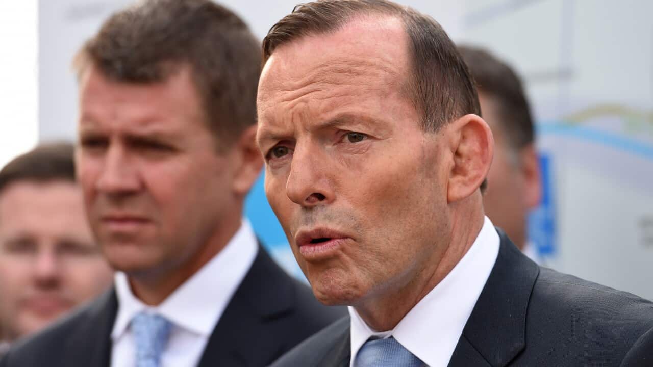 Prime Minister Tony Abbott along with NSW Premier Mike Baird speak to the media in Sydney. (AAP Image/Dan Himbrechts) 