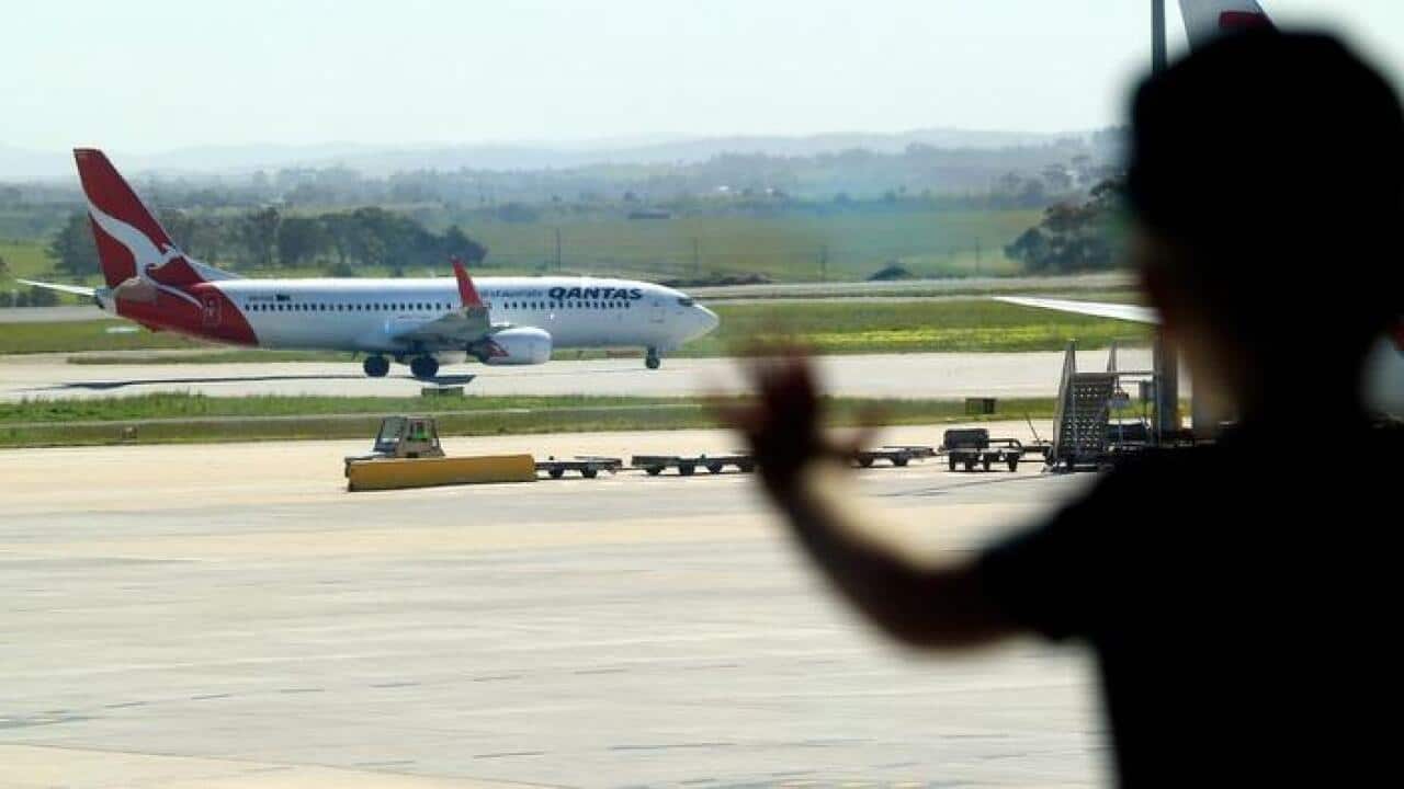 A plane taxiing at Tullamarine Airport in Melbourne (AAP)