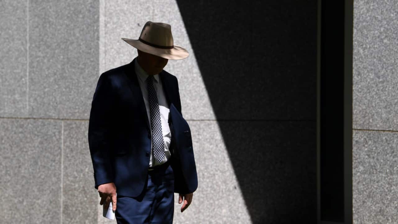 Barnaby Joyce arrives at his press conference